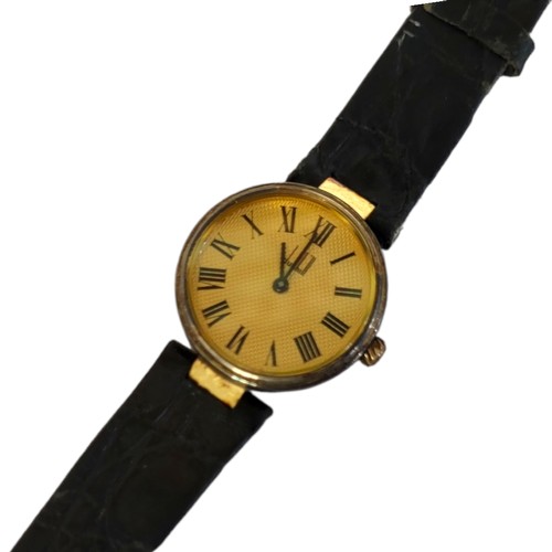 54 - DUNHILL, A VINTAGE SILVER GILT LADIES’ WRISTWATCH
Having a gold tone dial with Roman number markings... 