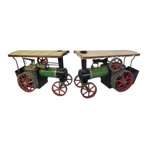 254 - TWO MID 20TH CENTURY ENGLISH MADE MAMOD METAL AND TIN STEAM ENGINE TRACTORS 
Both having original pa... 