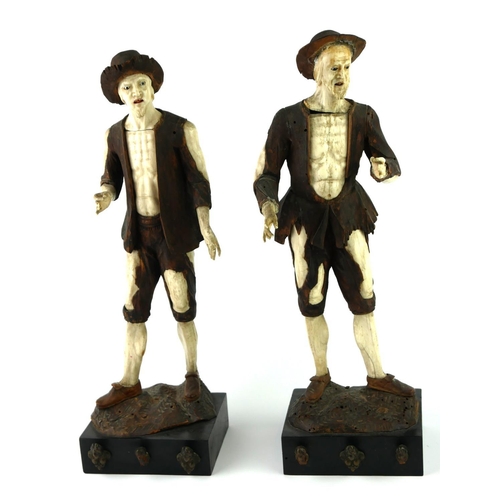 316 - IN THE MANNER OF SIMON TROGER, AUSTRIAN, 1683 - 1768, TWO BONE AND WALNUT FIGURES
Peasants in rags.
... 