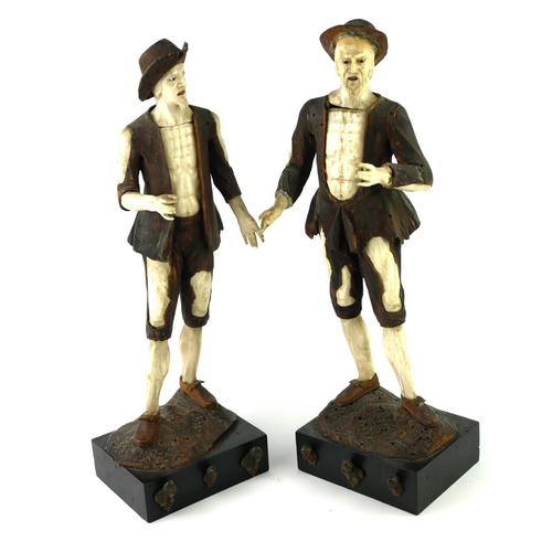 316 - IN THE MANNER OF SIMON TROGER, AUSTRIAN, 1683 - 1768, TWO BONE AND WALNUT FIGURES
Peasants in rags.
... 