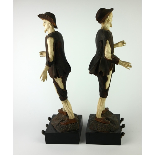 316 - IN THE MANNER OF SIMON TROGER, AUSTRIAN, 1683 - 1768, TWO BONE AND WALNUT FIGURES
Peasants in rags.
... 