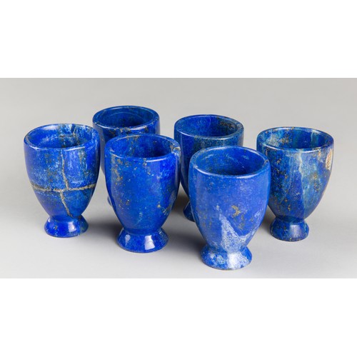 1014 - A SET OF SIX LAPIS LAZULI EGG STANDS.
Each (h 6cm x w 4.5cm x d 4.5cm)