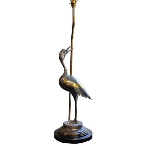 341 - A MID 20TH CENTURY CAST METAL ALUMINIUM STORK STANDING LAMP BASE MODELLED AS A STANDING ORIENTAL STO... 