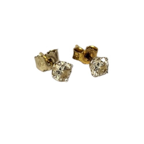 22A - A PAIR OF 18CT GOLD AND DIAMOND STUD EARRINGS
Each set with a round cut diamond.
(approx total diamo... 