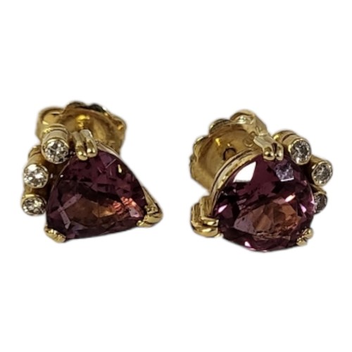 27A - A PAIR OF 18CT GOLD, DIAMOND AND GEM SET EARRINGS
Set with a heart form pink stone with round cut di... 