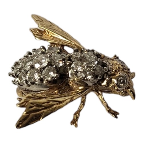 35A - A 14CT GOLD AND DIAMOND BEE BROOCH
Having an arrangement of round cut diamonds forming a cluster and... 