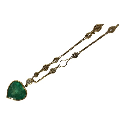 41A - A 14CT GOLD, EMERALD AND DIAMOND PENDANT NECKLACE
Heart cut emerald in a pierced gold mount surmount... 