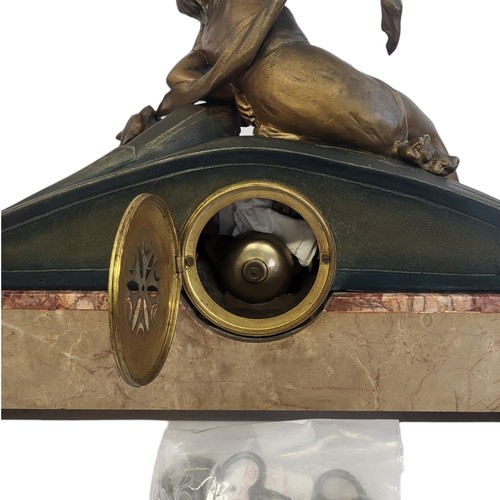 42 - AN ART DECO SPELTER AND MARBLE FIGURAL MANTLE CLOCK GARNITURE 
Semiclad female with panther seated o... 