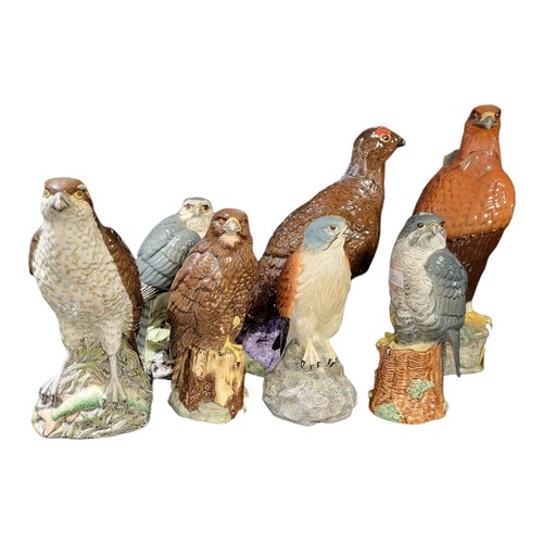 135 - BESWICK, GOLDEN EAGLE, A SCOTCH WHISKEY POTTERY DECANTER 
Peter Thomson of Perth, modelled in 1969 b... 