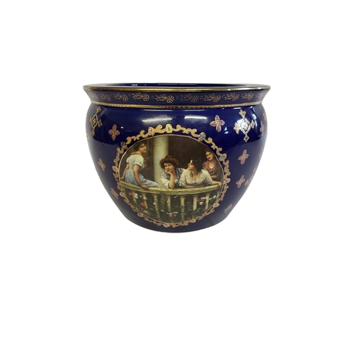 147 - LIMOGES, A 20TH CENTURY ROYAL JARDINIÈRE
With transfer printed scene, three maidens and enamelled de... 