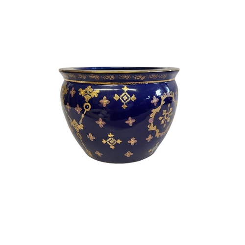 147 - LIMOGES, A 20TH CENTURY ROYAL JARDINIÈRE
With transfer printed scene, three maidens and enamelled de... 