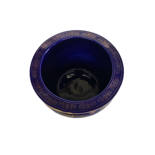 147 - LIMOGES, A 20TH CENTURY ROYAL JARDINIÈRE
With transfer printed scene, three maidens and enamelled de... 