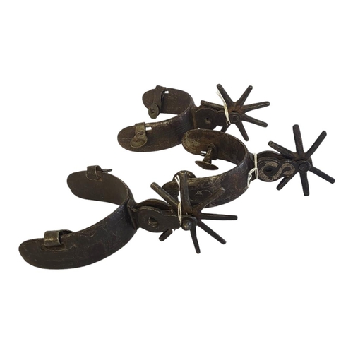 152 - A PAIR OF 19TH CENTURY CAST IRON SPURS
Having silver inlay with wheel spur to rear, together with a ... 