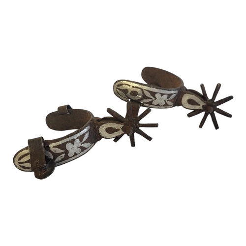 153 - A PAIR OF SOUTH AMERICAN CAST IRON SPURS
Having silver inlay and whole spike to rear.
(approx 13cm)
... 
