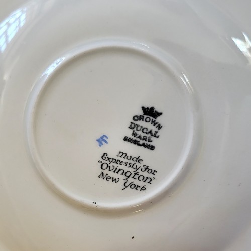 122 - CROWN DUCAL, AN ART DECO TEA/BREAKFAST SERVICE FOR SIX
Decorated with traditional English country hu... 