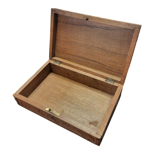 115 - AN EARLY 20TH CENTURY CHINESE WOOD RECTANGULAR DOUBLE DRAGON AND PEARL OF WISDOM BOX AND COVER, CIRC... 