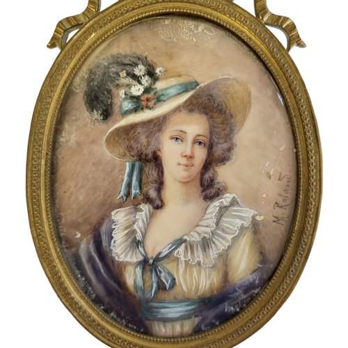 462 - M. ROLLAND, A LATE 19TH CENTURY OVAL MINIATURE PAINTING ON IVORY
Portrait of a lady in feather straw... 