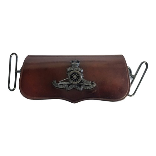 14 - A BRITISH ROYAL ARTILLERY LEATHER CROSS BELT AND POUCH
Brown leather with regimental badge to pouch.... 