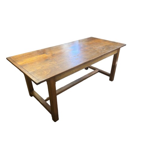 550 - A COUNTRY PINE REFECTORY TABLE
With plank top on square chamfered.
(185cm x 84cm x 76cm)

Condition:... 