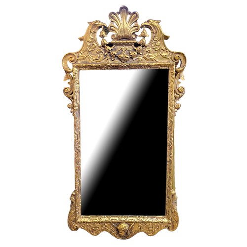 552 - AN 18TH CENTURY DESIGN GILT FRAMED MIRROR
With double eagle head crest above silvered plate.
(64cm x... 