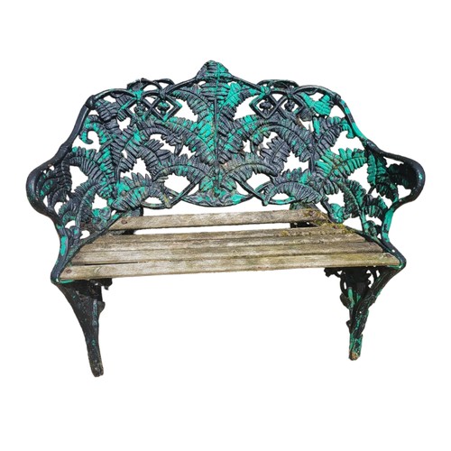 561 - A SMALL COALBROOKDALE DESIGN FERN LEAF BENCH
Iron two seat garden bench.
(113cm x 50cm x 84cm)

Cond... 