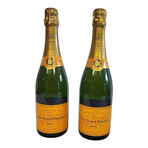 201 - VEUVE CLICQUOT, TWO BOTTLES OF VINTAGE CHAMPAGNE
Orange label marked 'Maison Fondee', 750ml.

Condit... 