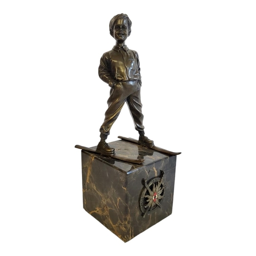 233 - FERDINAND PREISS, 1882 - 1943, A BRONZE AND MARBLE FIGURE OF A BOY SKIER
Standing pose, inscribed to... 