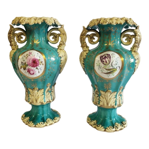 236 - A PAIR OF 19TH CENTURY PORCELAIN VASES
Twin handles with hand painted decoration on green ground.
(a... 