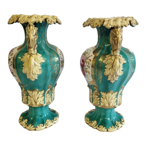 236 - A PAIR OF 19TH CENTURY PORCELAIN VASES
Twin handles with hand painted decoration on green ground.
(a... 