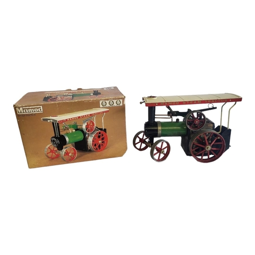 242 - MAMOD, A VINTAGE TINPLATE MODEL STEAM TRACTOR ENGINE
Green and red livery, complete with burner and ... 