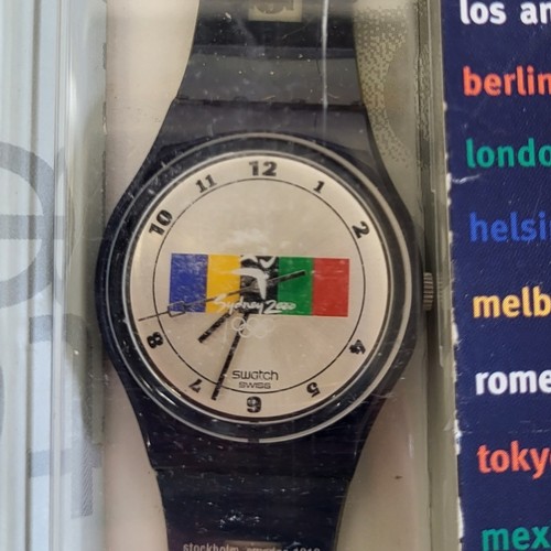 14 - SWATCH, SYDNEY OLYMPICS, A VINTAGE GENT’S WRISTWATCH, DATED 2000
In plastic capsule with additional ... 