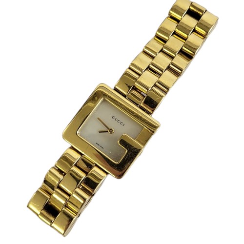 16 - GUCCI, AN 18CT GOLD AND MOTHER OF PEARL 'G' LADIES’ WRISTWATCH
The square form mother of pearl dial ... 