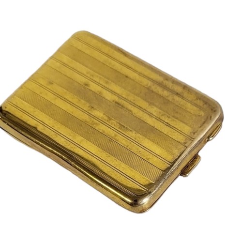 27 - AN EARLY 20TH CENTURY 9CT GOLD RECTANGULAR MATCHCASE
With engine turned decoration.
(approx 4cm x 5.... 