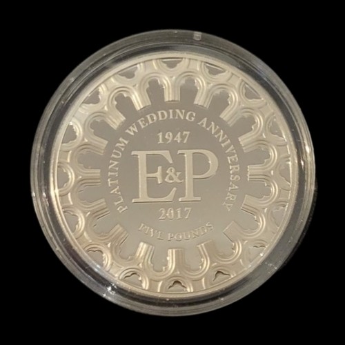 45 - A PLATINUM ROYAL COMMEMORATIVE FIVE POUND PROOF COIN, DATED 2017 
To celebrate the platinum wedding ... 