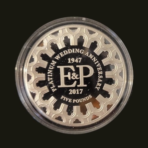 45 - A PLATINUM ROYAL COMMEMORATIVE FIVE POUND PROOF COIN, DATED 2017 
To celebrate the platinum wedding ... 