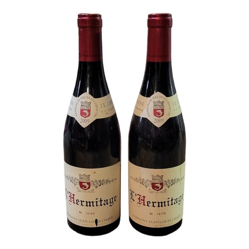 301 - L'HERMITAGE, TWO BOTTLES OF VINTAGE RED WINE, DATED 2009 
Ed cap with cream label, marked Germaine J... 