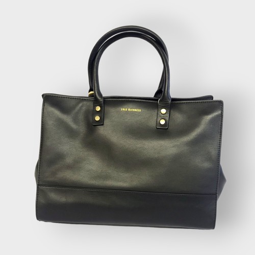 280 - LULU GUINNESS, A POLISHED BLACK LEATHER SHOULDER BAG
Having a gilt brass clasp and frame, complete w... 