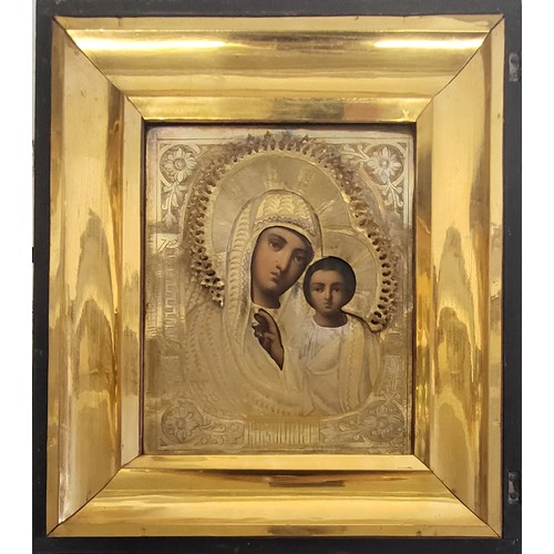 238A - A 19TH CENTURY RUSSIAN WHITE METAL CLAD OIL ON PANEL RELIGIOUS ICON
Madonna and Child with engraved ... 