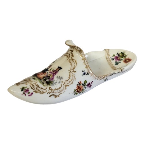 260 - MEISSEN, A 19TH CENTURY HARD PASTE PORCELAIN NOVELTY MODEL OF A SHOE/SLIPPER
Painted with Watteauesq... 