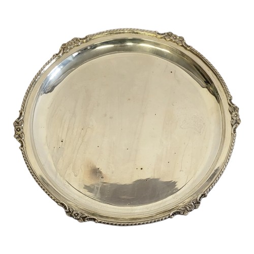 71 - A VINTAGE INDIAN SILVER CIRCULAR SALVER
With scrolled floral edge, marked 'Silver' to base.
(approx ... 