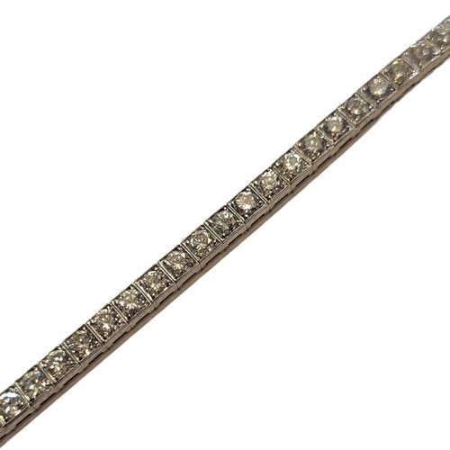 97 - A VINTAGE WHITE METAL AND 4.5CT DIAMOND TENNIS BRACELET
Having a single row of round cut diamonds, i... 