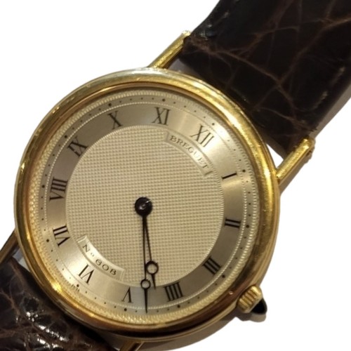 98 - BREGUET, NO 608, A VINTAGE 18CT GOLD GENT’S WRISTWATCH
Having a textured silver tone dial and sapphi... 