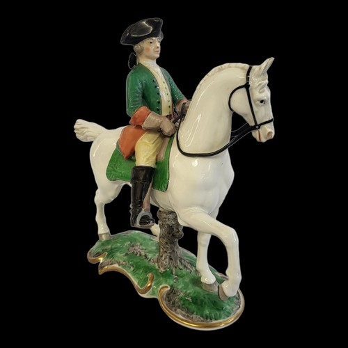 333 - A NYMPHENBURG LATE 19TH/EARLY 20TH CENTURY HARD PASTE PORCELAIN FIGURAL GROUP, PRUSSIAN HUNTER ON HO... 