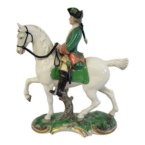 333 - A NYMPHENBURG LATE 19TH/EARLY 20TH CENTURY HARD PASTE PORCELAIN FIGURAL GROUP, PRUSSIAN HUNTER ON HO... 