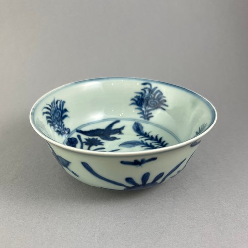 346 - A CHINESE MING DESIGN BLUE AND WHITE PORCELAIN BOWL
Hand painted with water plants and birds, bearin... 