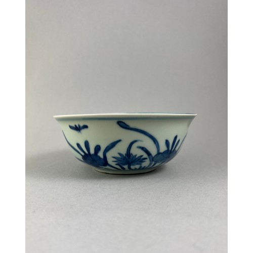 346 - A CHINESE MING DESIGN BLUE AND WHITE PORCELAIN BOWL
Hand painted with water plants and birds, bearin... 