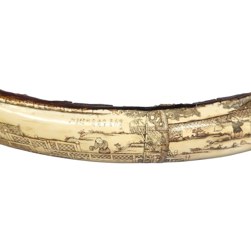 380 - A LARGE CARVED WOOLY MAMMOTH TUSK
Finely figured with numerous elders, officials, scholars, children... 