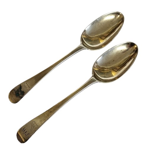 131 - ADRIAN TUPPY, A PAIR OF GEORGIAN IRISH SILVER DESSERT SPOONS
With engraved family crest of a bird, m... 