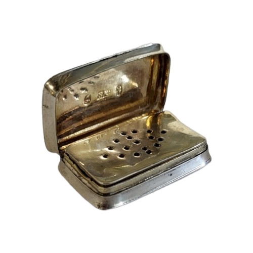 133 - A GEORGIAN SILVER RECTANGULAR VINAIGRETTE
With pierced lid and gilt interior, hallmarked London, 178... 