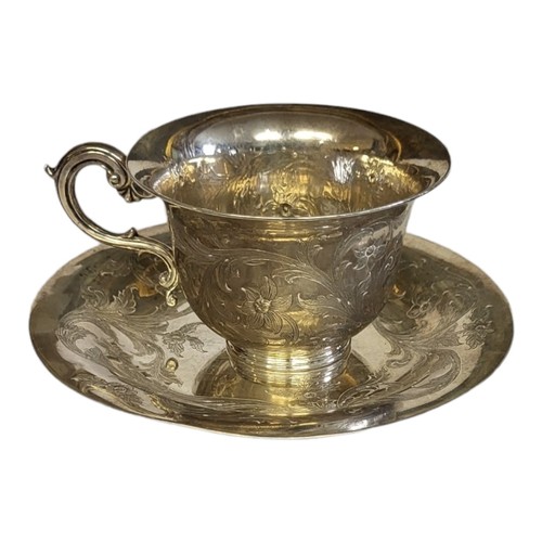 152 - HAMILTON AND CO., INDIA, A MID 19TH CENTURY SILVER CUP AND SAUCER
Having a single handle and engrave... 